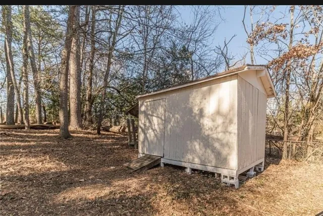 a backyard of a house with lots of green space