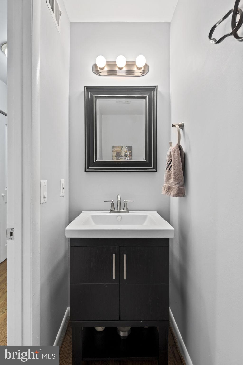 11740 Decade Court Reston, VA 20191 - Photo 13 of 44 Remodeled powder room w/ newer vanity