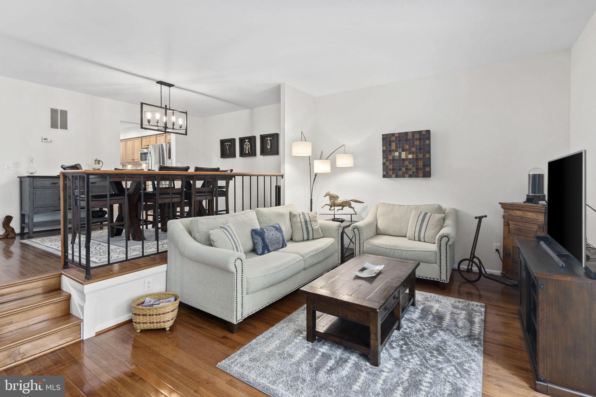 11740 Decade Court Reston, VA 20191 - Photo 14 of 44 Open concept living room off dining room