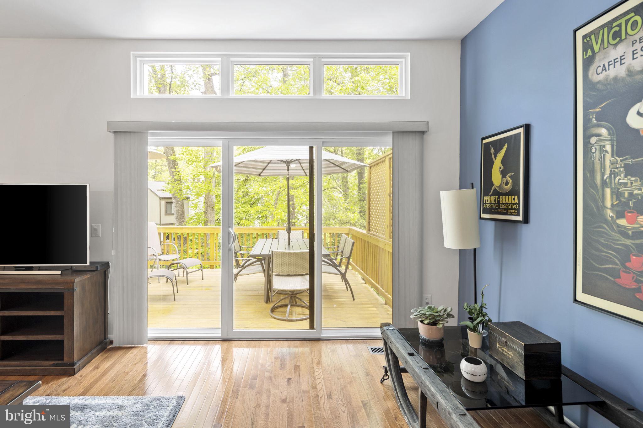 11740 Decade Court Reston, VA 20191 - Photo 18 of 44 Triple sliding glass door w/ transom window