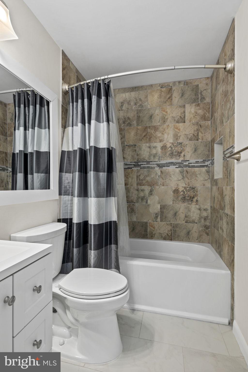11740 Decade Court Reston, VA 20191 - Photo 29 of 44 Remodeled hall bath w/ ceramic tile floors