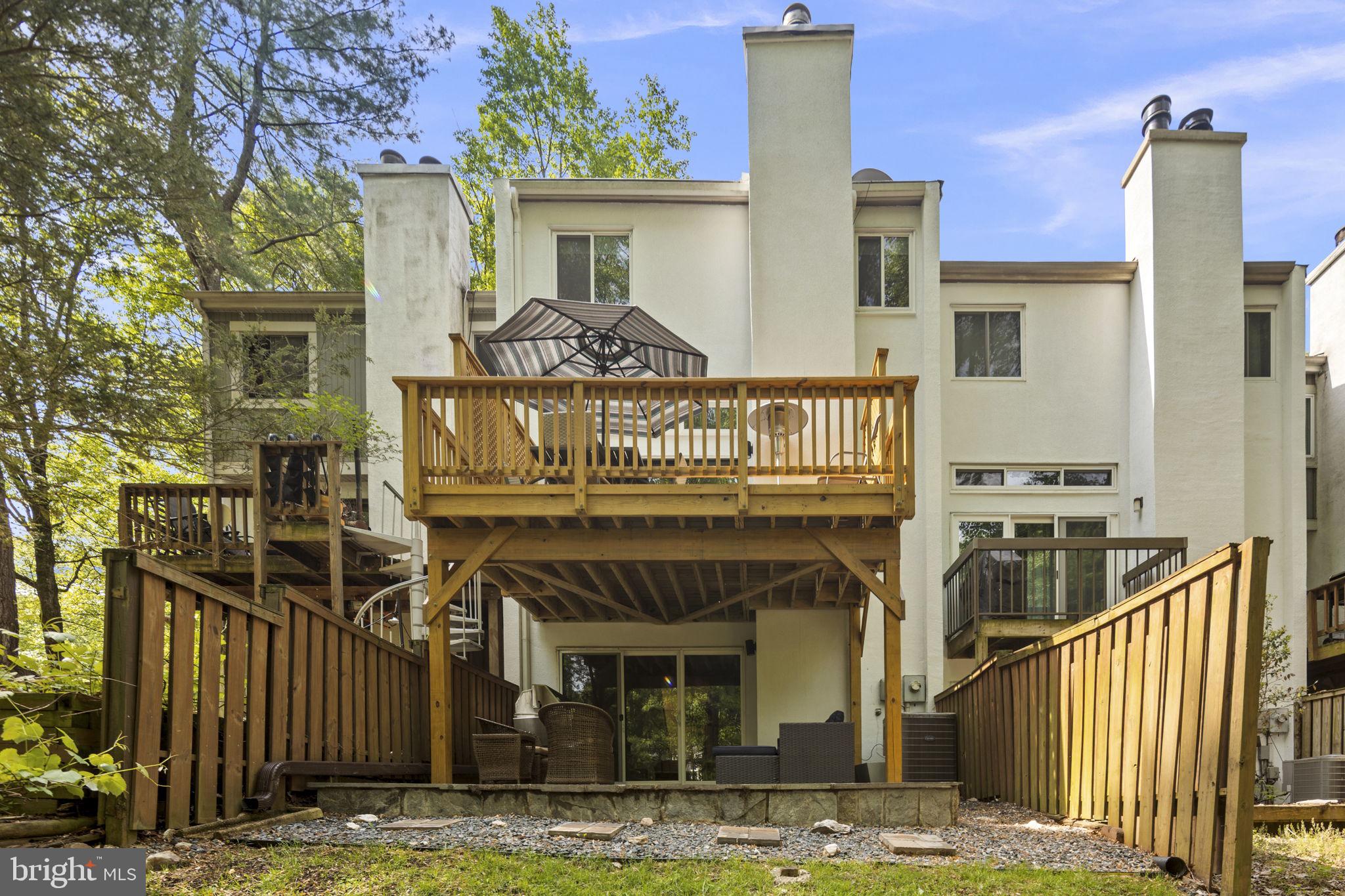 11740 Decade Court Reston, VA 20191 - Photo 41 of 44 View of back of home w/ privacy fencing