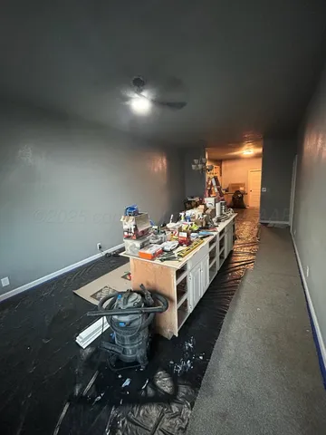 a bed room with furniture and a chandelier