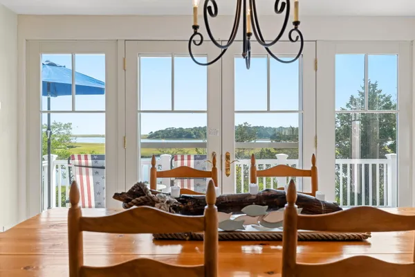 a view of a livingroom with furniture and window