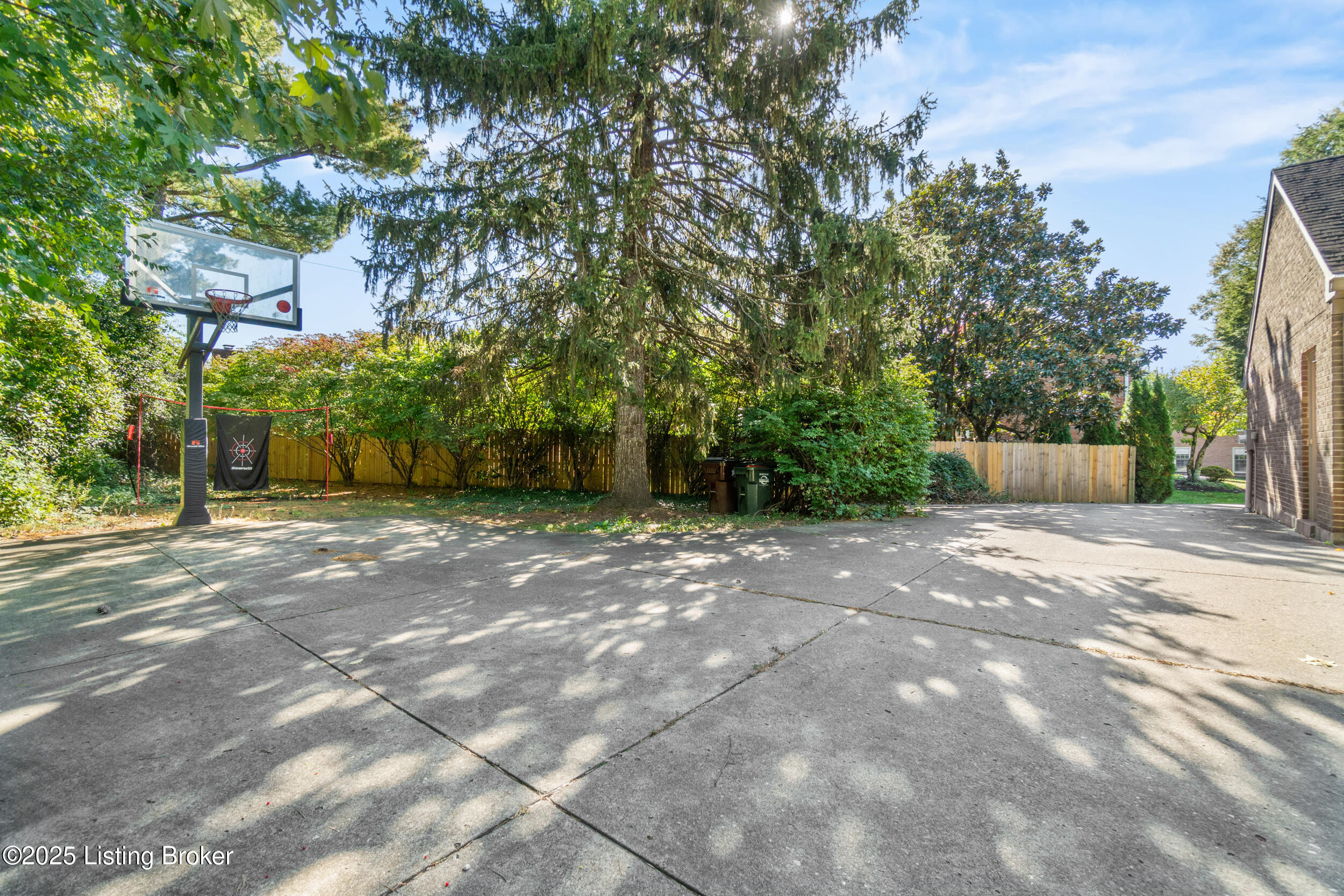 2903 Lightheart Road Louisville, KY 40222 - Photo 43 of 48 Two Goalrilla Basketball Goals were added to the expanded driveway. It created a 47' Court