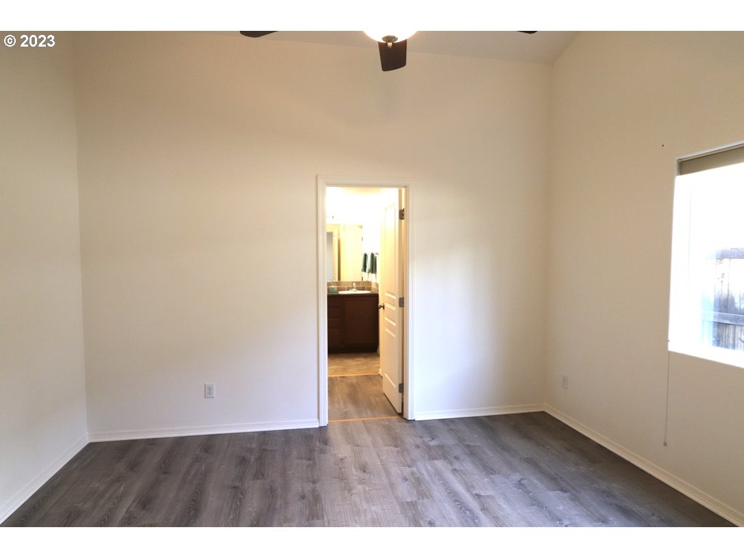 4872 Holly Street Springfield, OR 97478 - Photo 9 of 24 a view of an empty room and window