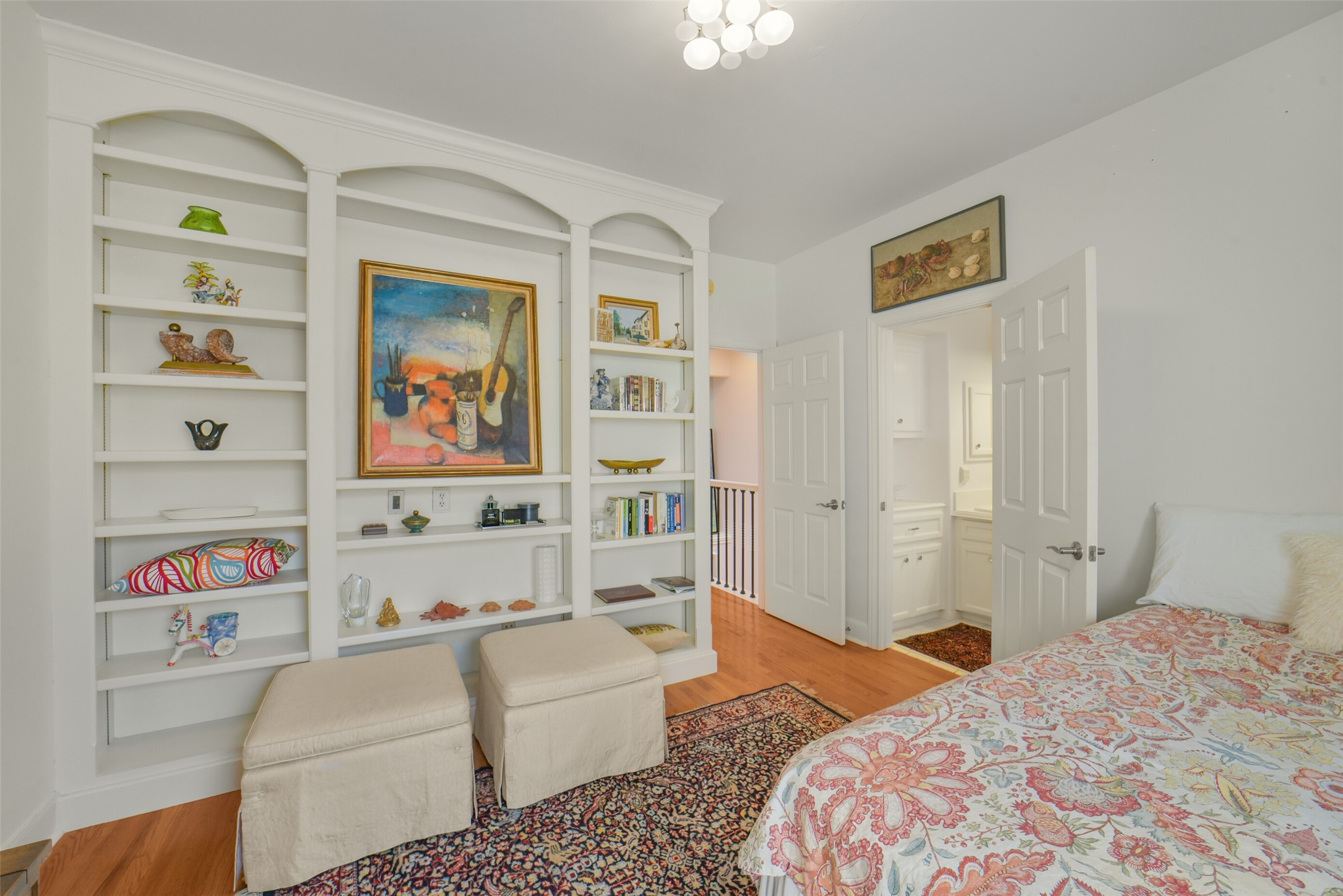 2026 Welch Street Houston, TX 77019 - Photo 13 of 28 secondary bedroom has built in shelving and fits a queen bed