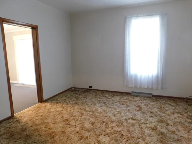 a view of a window in an empty room