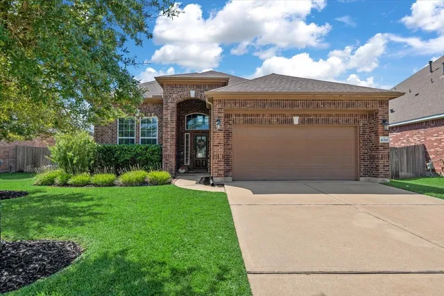 a front view of house with yard