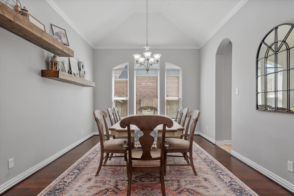16319 Denise Terrace Drive Hockley, TX 77447 - Photo 13 of 49 a view of a dining room with furniture and chandelier