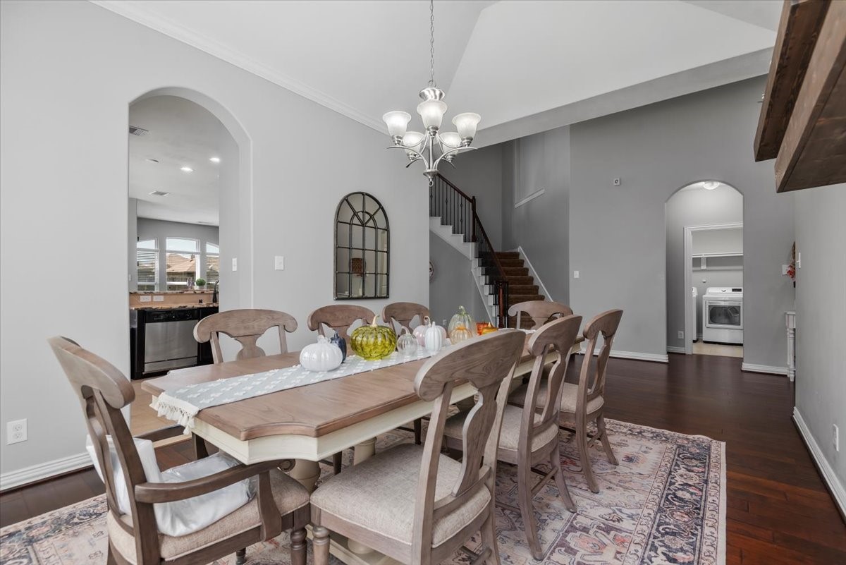 16319 Denise Terrace Drive Hockley, TX 77447 - Photo 14 of 49 a view of a dining room with furniture and wooden floor