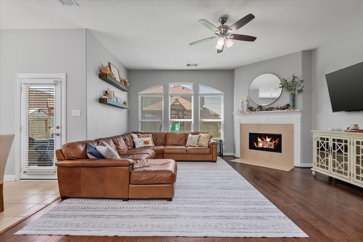 16319 Denise Terrace Drive Hockley, TX 77447 - Photo 23 of 49 a living room with furniture and a fireplace