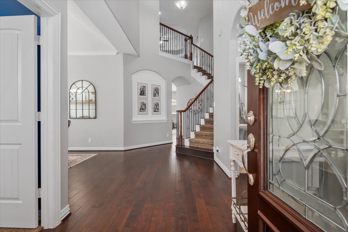 16319 Denise Terrace Drive Hockley, TX 77447 - Photo 3 of 49 a view of an entryway with wooden floor