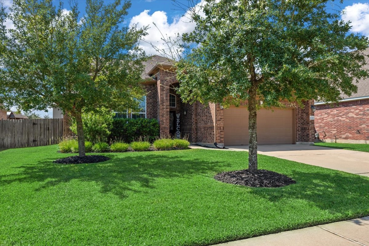 16319 Denise Terrace Drive Hockley, TX 77447 - Photo 7 of 49 a front view of a house with garden
