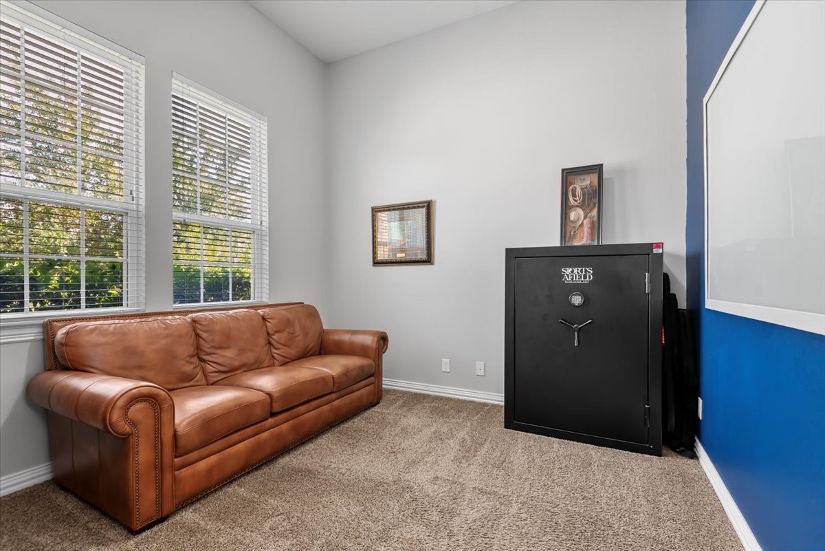 16319 Denise Terrace Drive Hockley, TX 77447 - Photo 9 of 49 a living room with furniture and a window