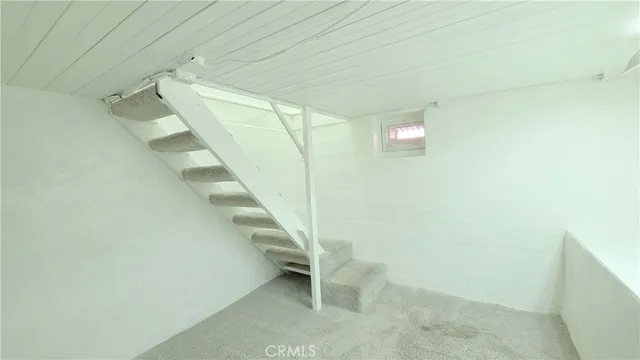 a view of entryway with stairs