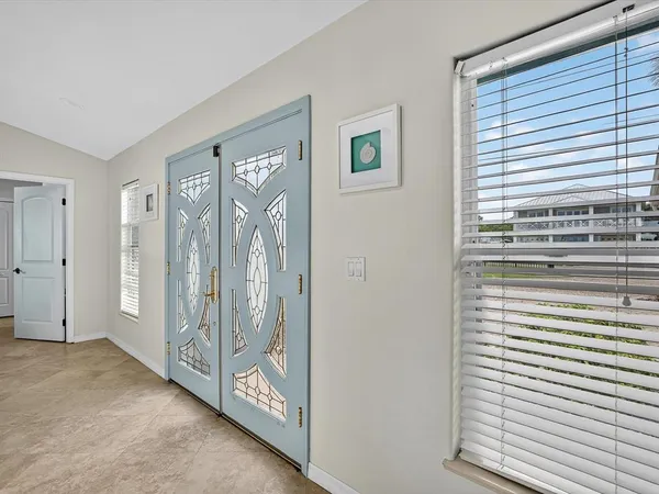 a view of a hallway with windows