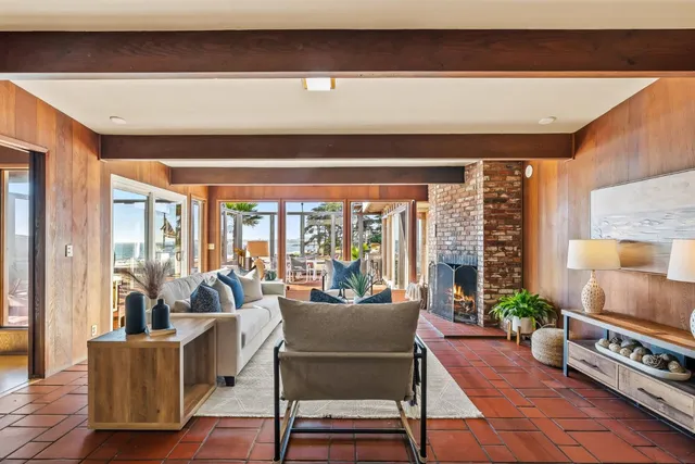 a kitchen with stainless steel appliances granite countertop a refrigerator and a stove