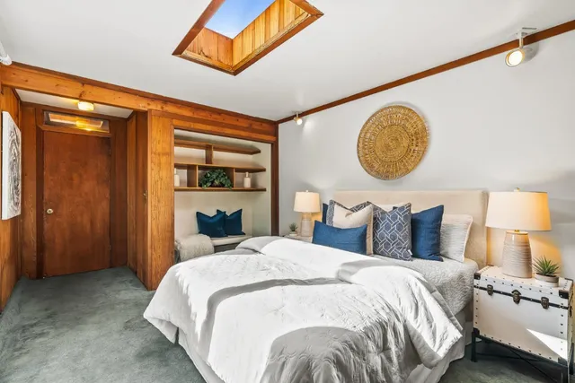 a view of a patio with table and chairs and potted plants