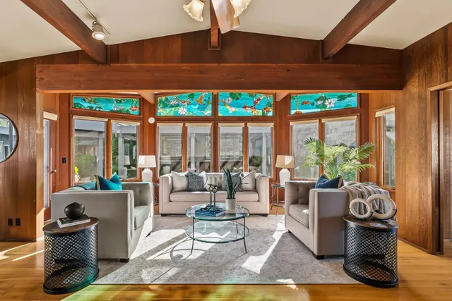 a view of a dining room with furniture window and outside view