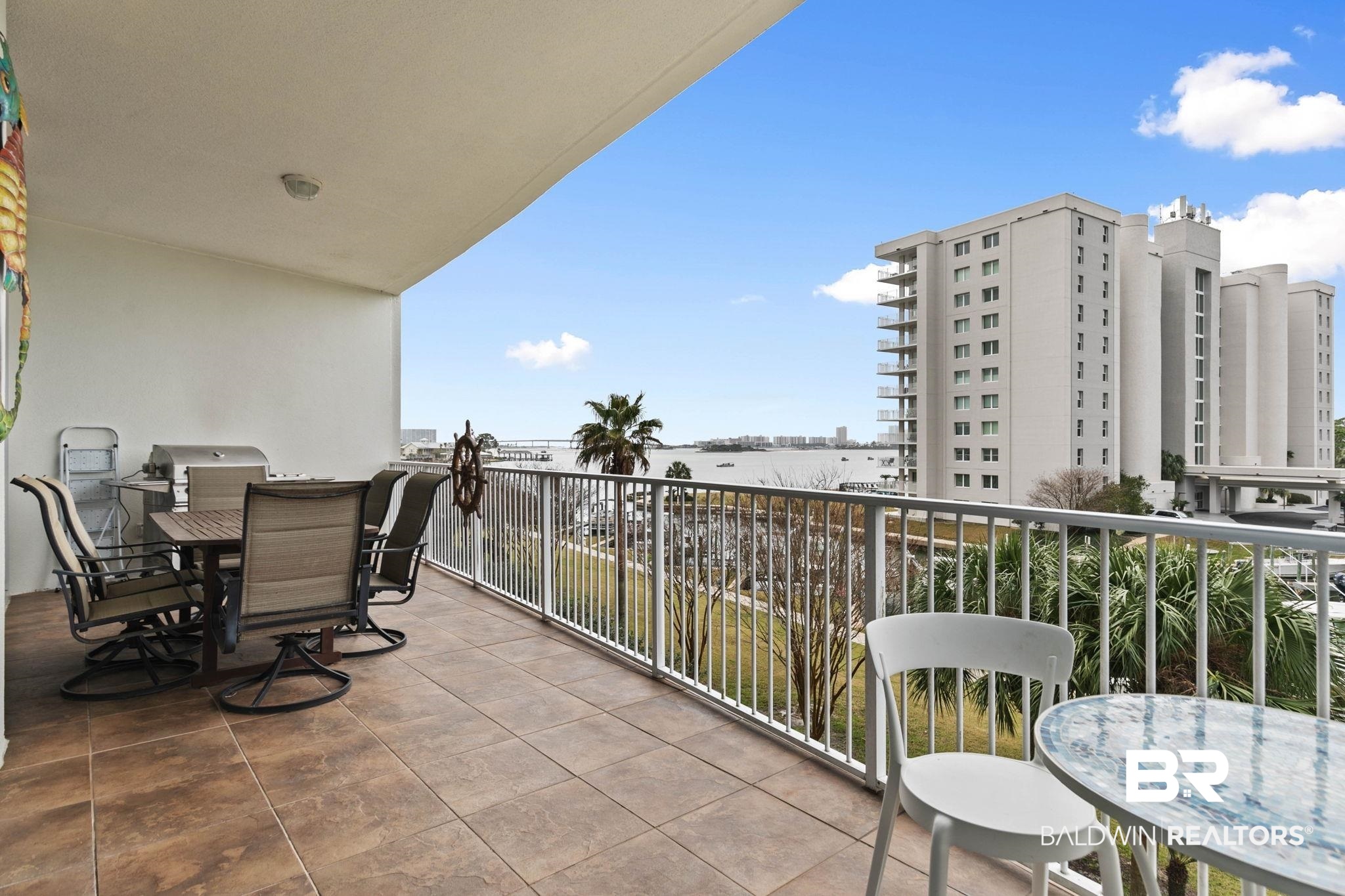 28250 Canal Road, Unit 208 Orange Beach, AL 36561 - Photo 22 of 53 Balcony featuring outdoor dining area