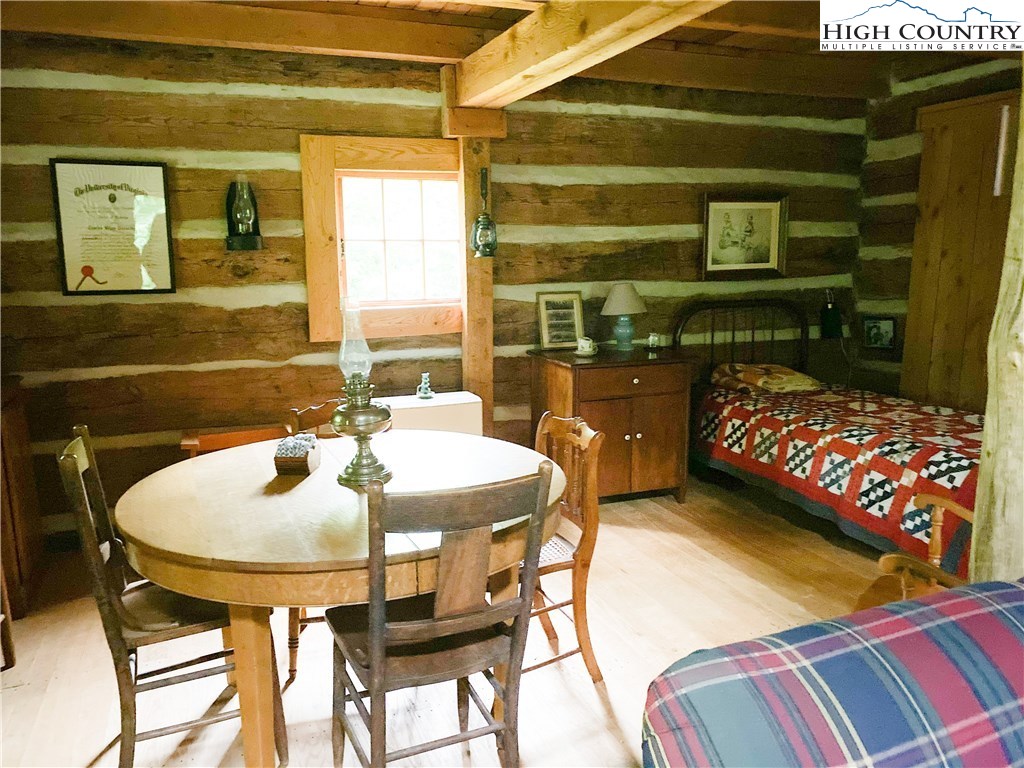 4360 Stones Chapel Road Elk Creek, VA 24326 - Photo 14 of 21 a bedroom with a bed and a mirror