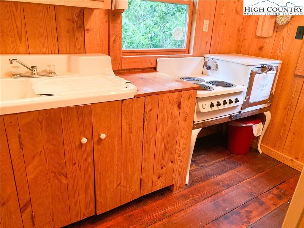 4360 Stones Chapel Road Elk Creek, VA 24326 - Photo 16 of 21 a bathroom with a sink and a window