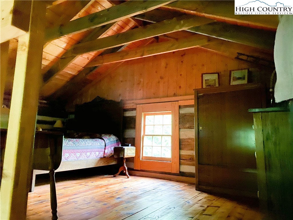 4360 Stones Chapel Road Elk Creek, VA 24326 - Photo 17 of 21 a bedroom with a bed and a window