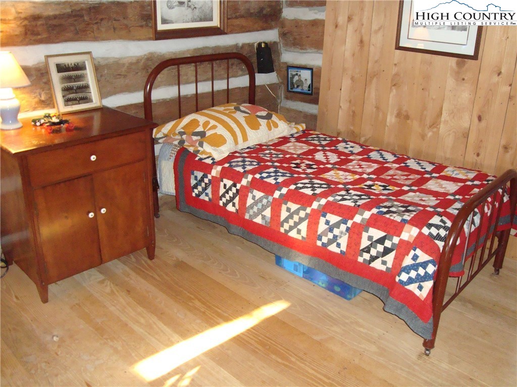 4360 Stones Chapel Road Elk Creek, VA 24326 - Photo 10 of 21 a bedroom with a bed and with a dresser