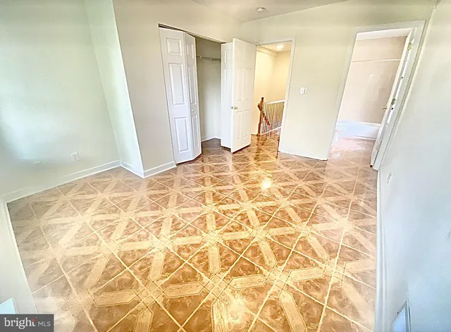 a view of a bathroom with sink and a mirror