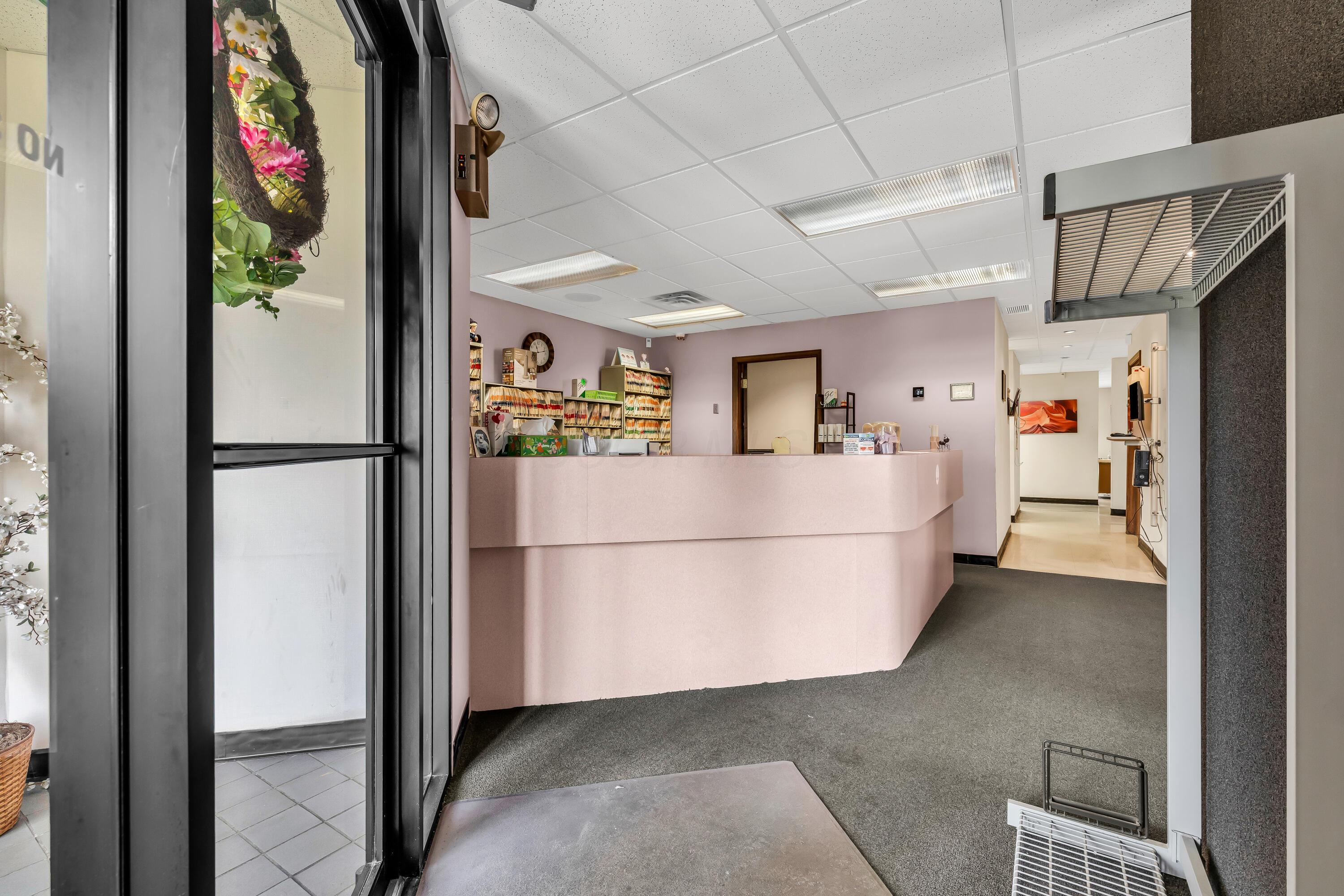 1240 Crescent Heights Road Marion, OH 43302 - Photo 8 of 60 • Blue carpet • Ivory painted walls • Acoustic ceiling tiles