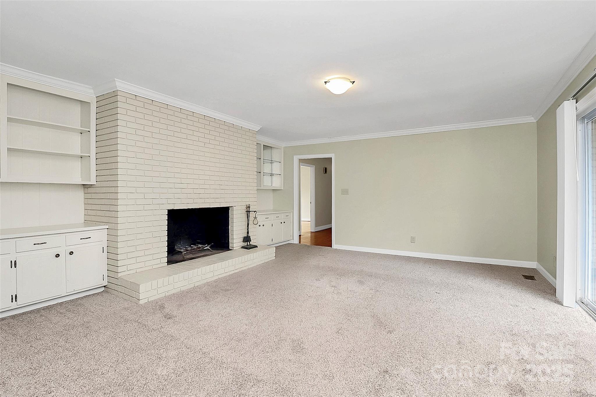 3200 Highview Road Charlotte, NC 28210 - Photo 14 of 48 a view of an empty room with a fireplace
