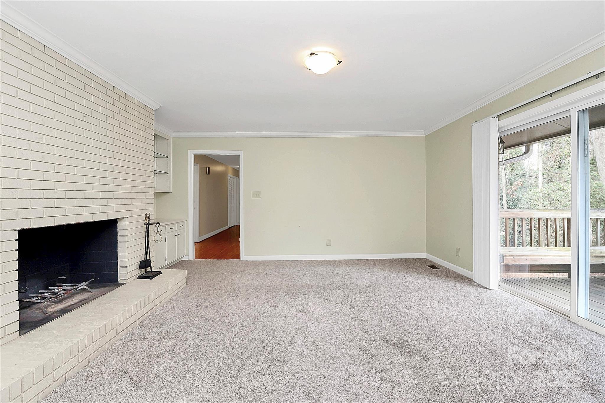3200 Highview Road Charlotte, NC 28210 - Photo 15 of 48 an empty room with windows and fireplace