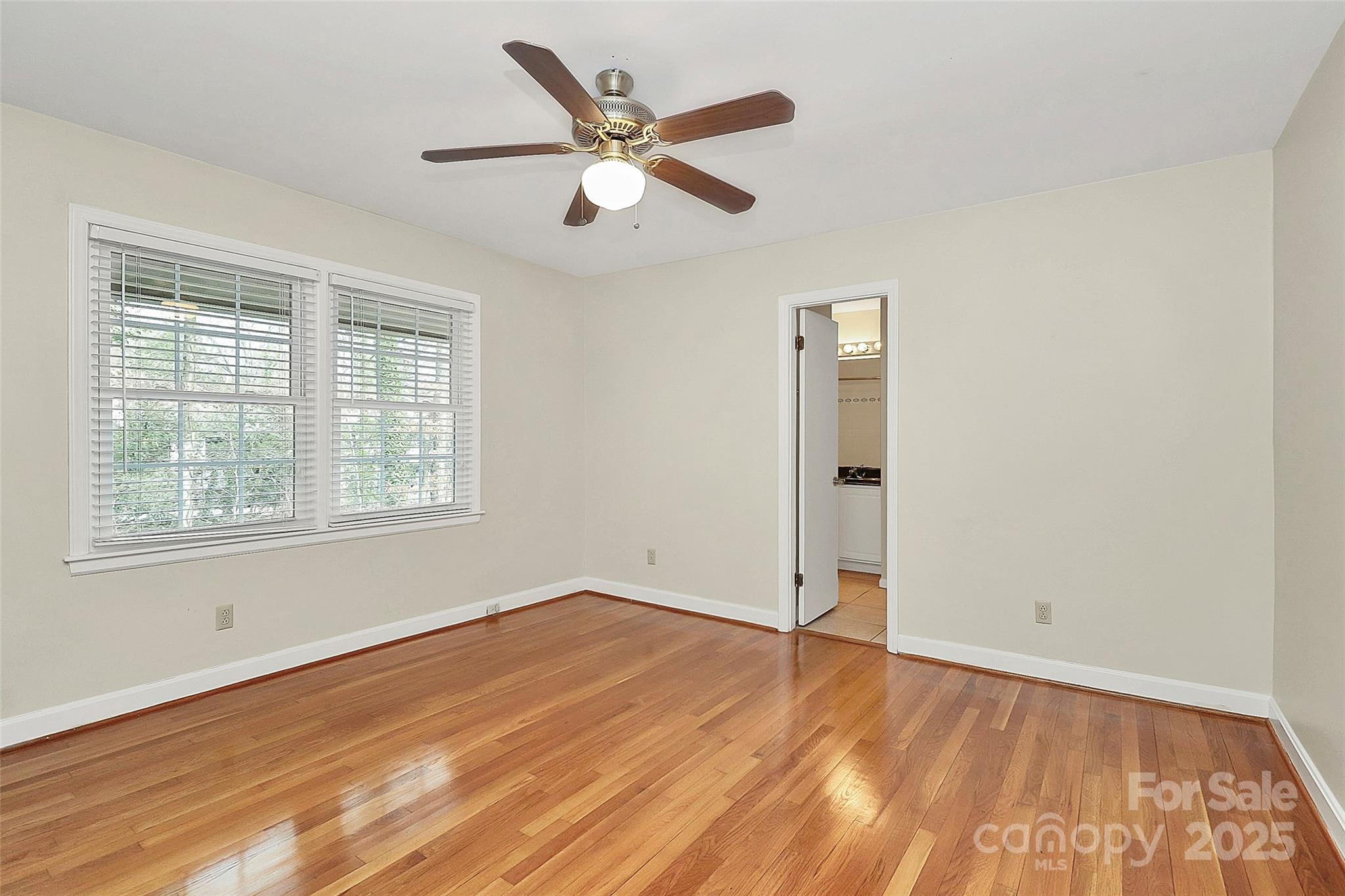 3200 Highview Road Charlotte, NC 28210 - Photo 21 of 48 wooden floor in an empty room with a window