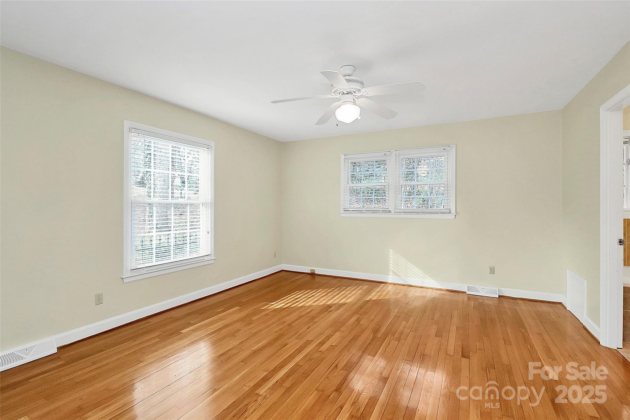 3200 Highview Road Charlotte, NC 28210 - Photo 24 of 48 a view of an empty room with wooden floor and a window