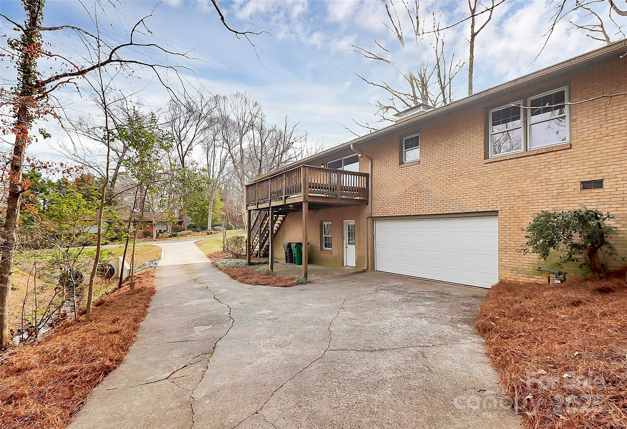 3200 Highview Road Charlotte, NC 28210 - Photo 36 of 48 a view of a house with a snow in the yard
