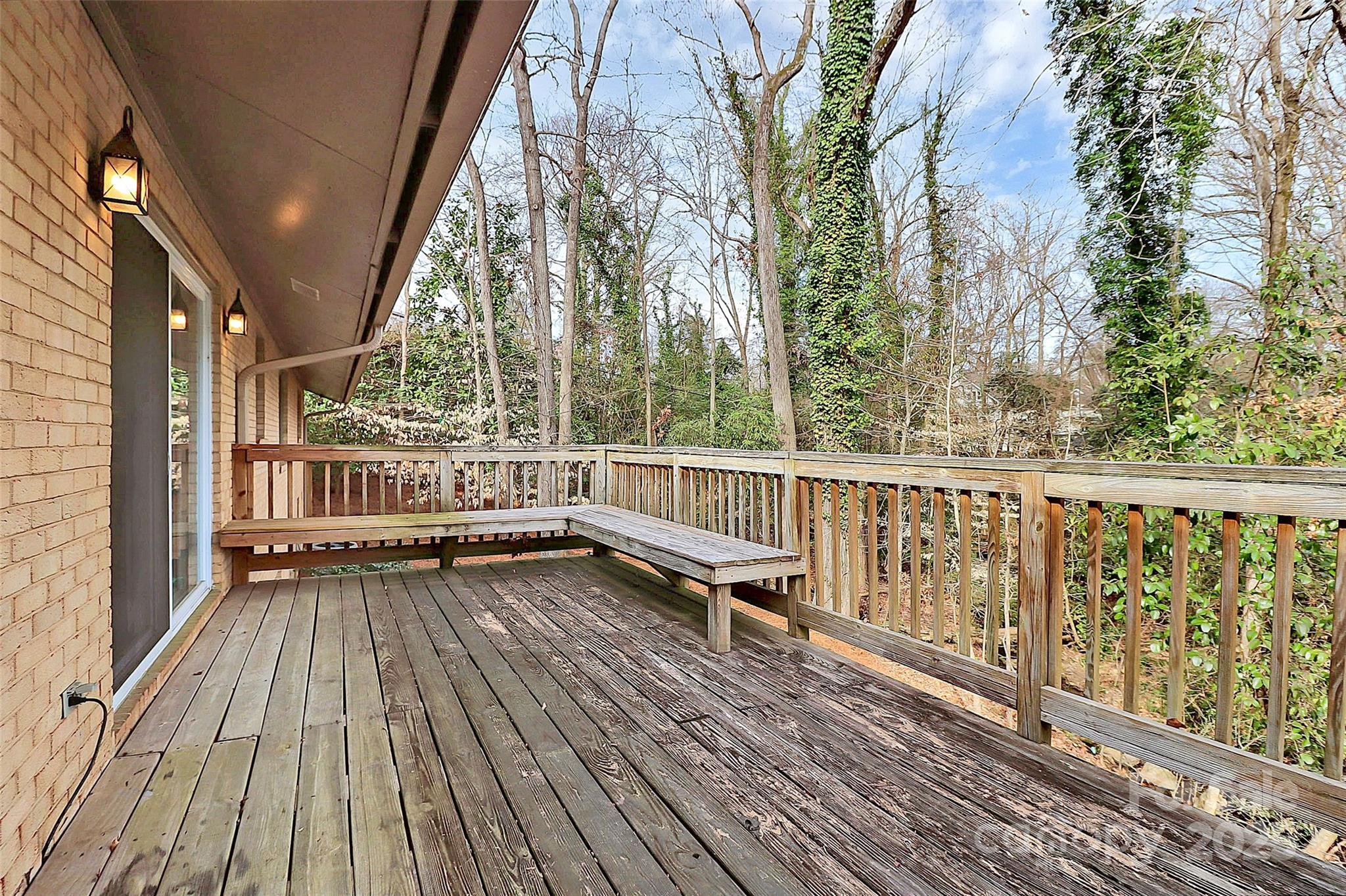 3200 Highview Road Charlotte, NC 28210 - Photo 38 of 48 a view of a balcony with wooden floor and outdoor space