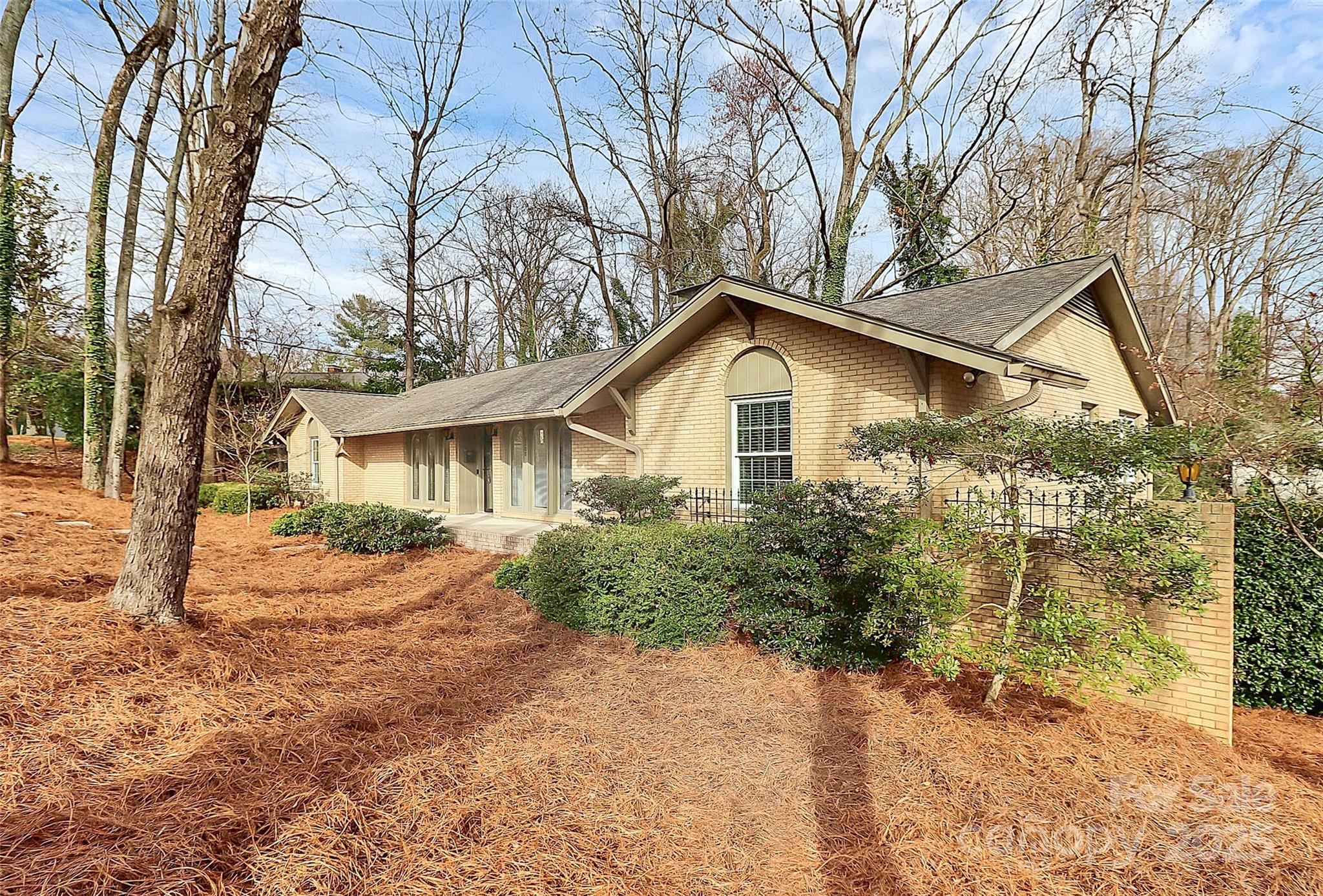 3200 Highview Road Charlotte, NC 28210 - Photo 40 of 48 a view of a house with a yard covered in snow