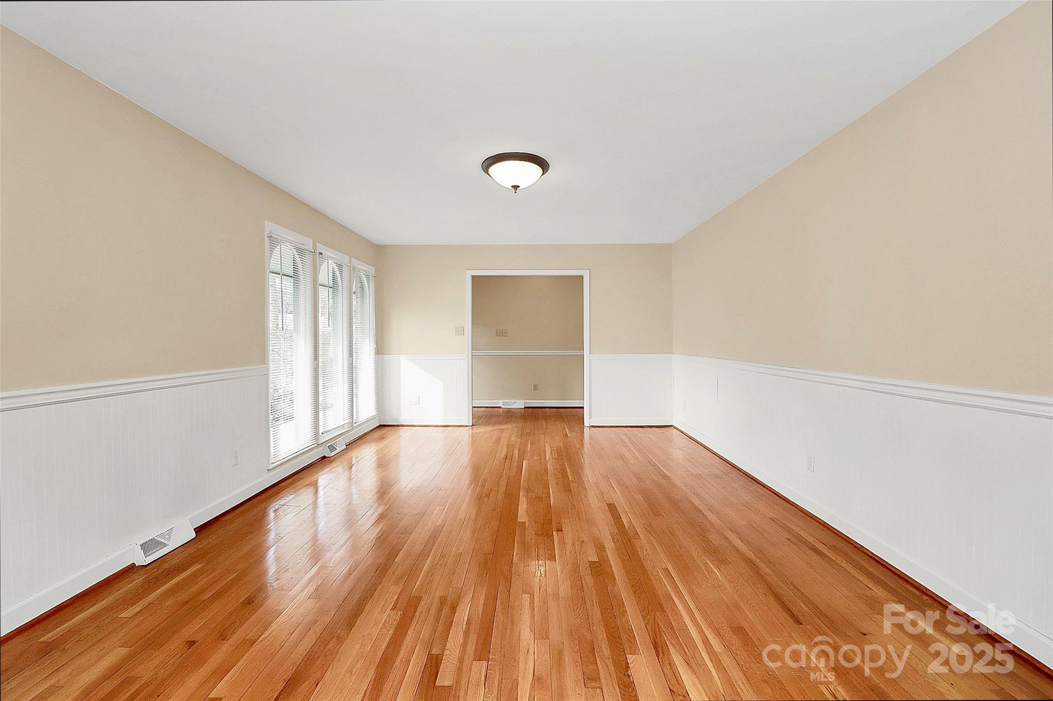 3200 Highview Road Charlotte, NC 28210 - Photo 5 of 48 wooden floor in an empty room with a window
