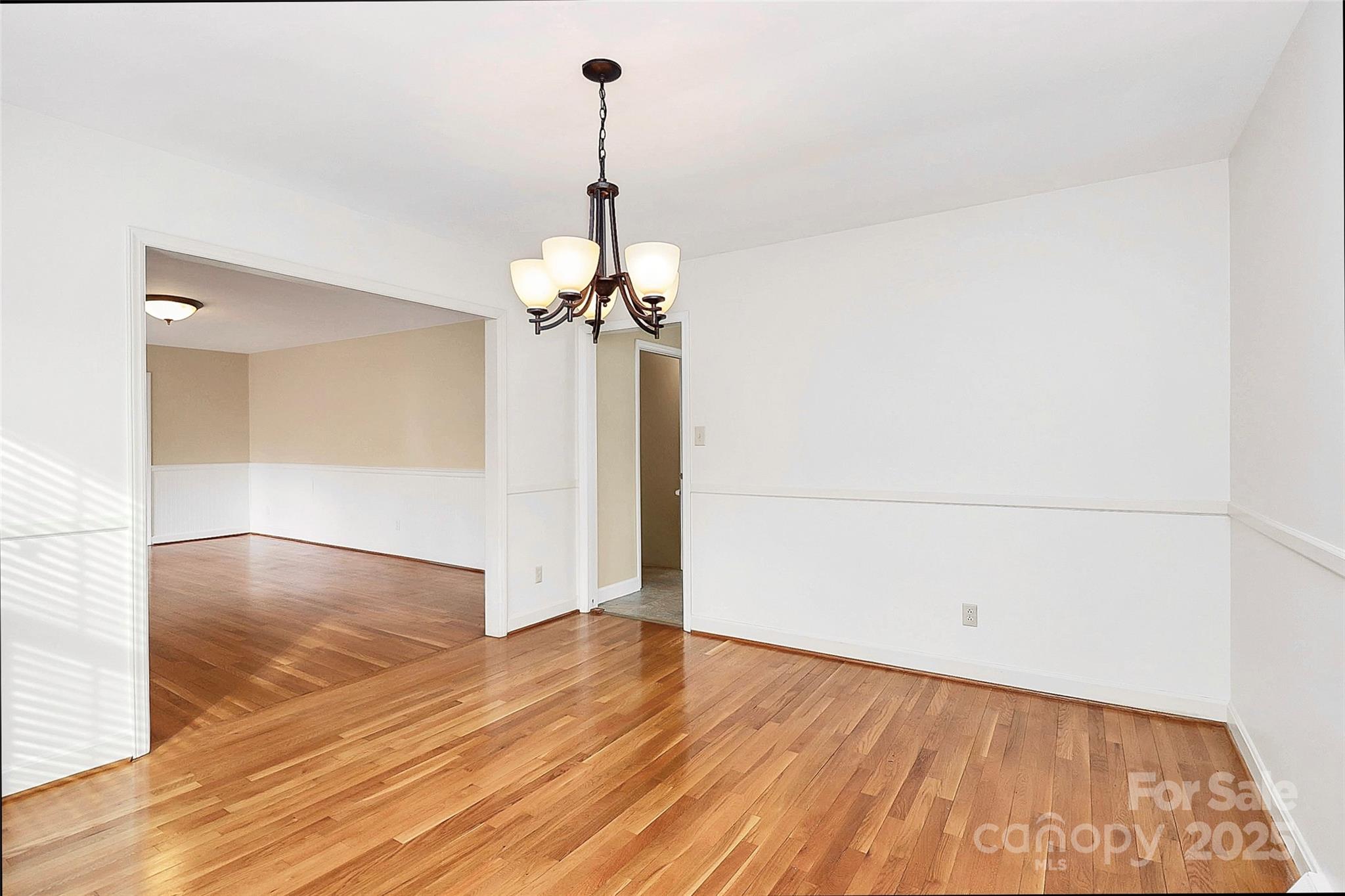 3200 Highview Road Charlotte, NC 28210 - Photo 7 of 48 a view of a room with wooden floor and cabinet