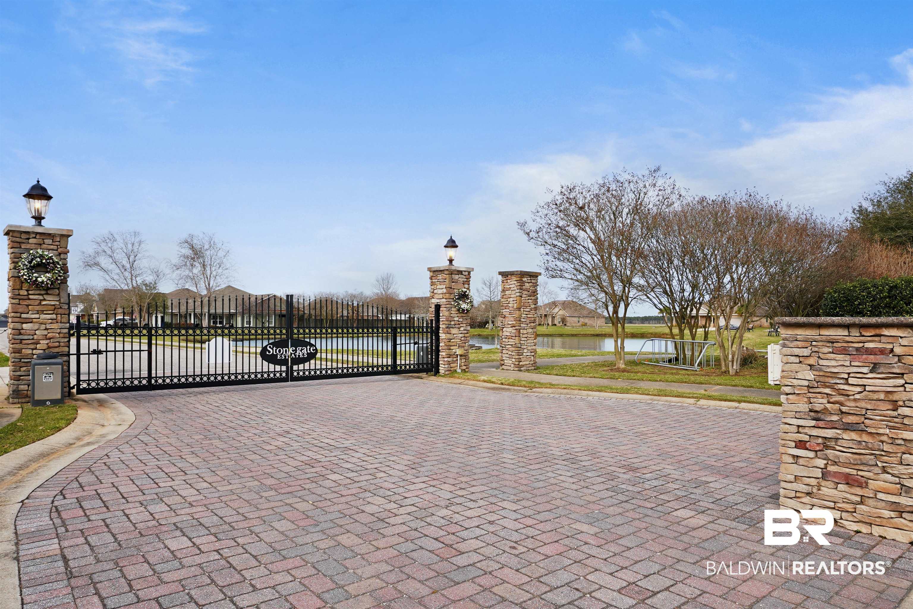 7090 Rocky Rd Loop Gulf Shores, AL 36542 - Photo 33 of 34 View of gate featuring a water view