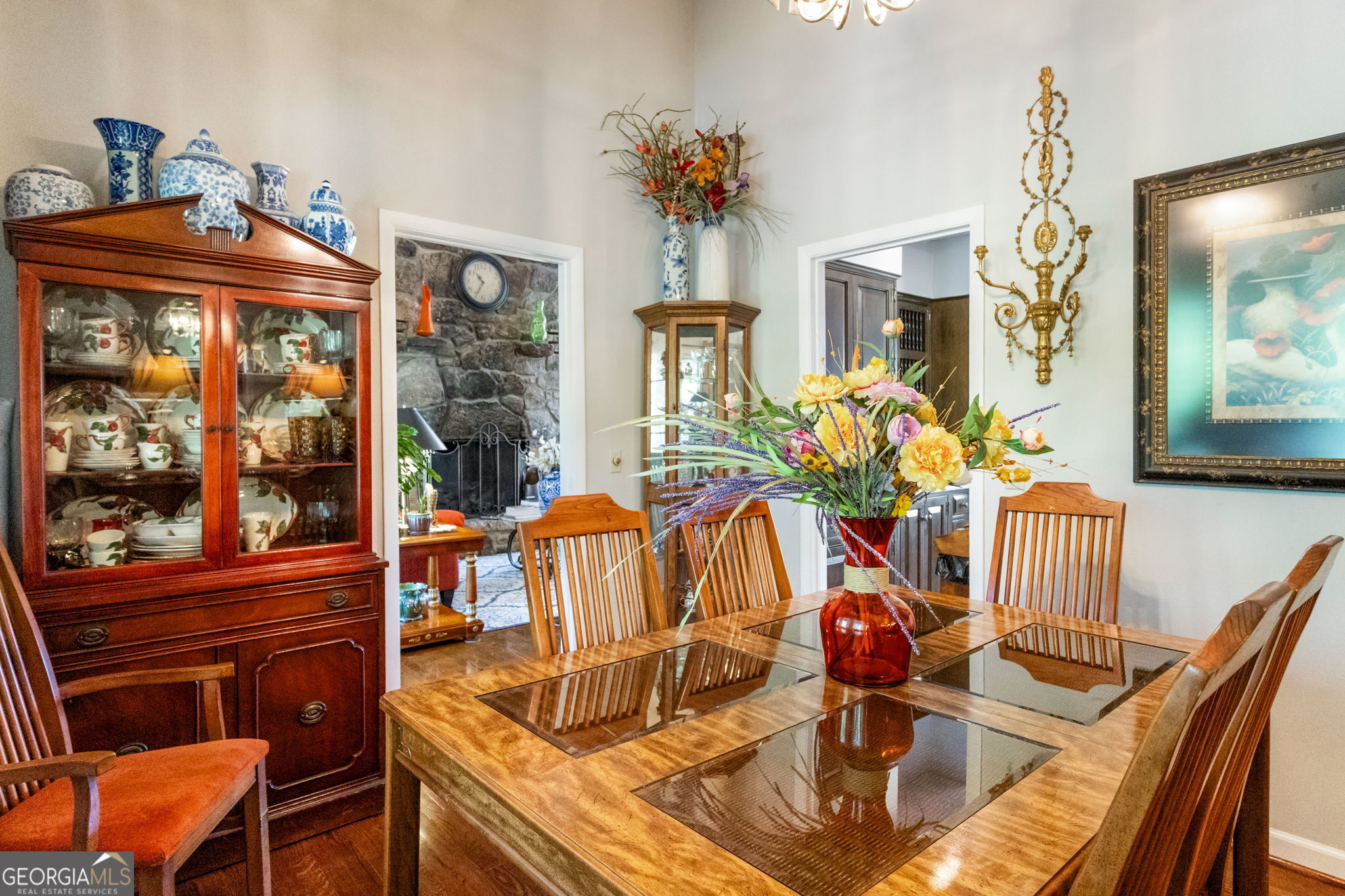 1509 High Point Road Bowdon, GA 30108 - Photo 12 of 33 a view of a dining room with furniture a chandelier and wooden floor