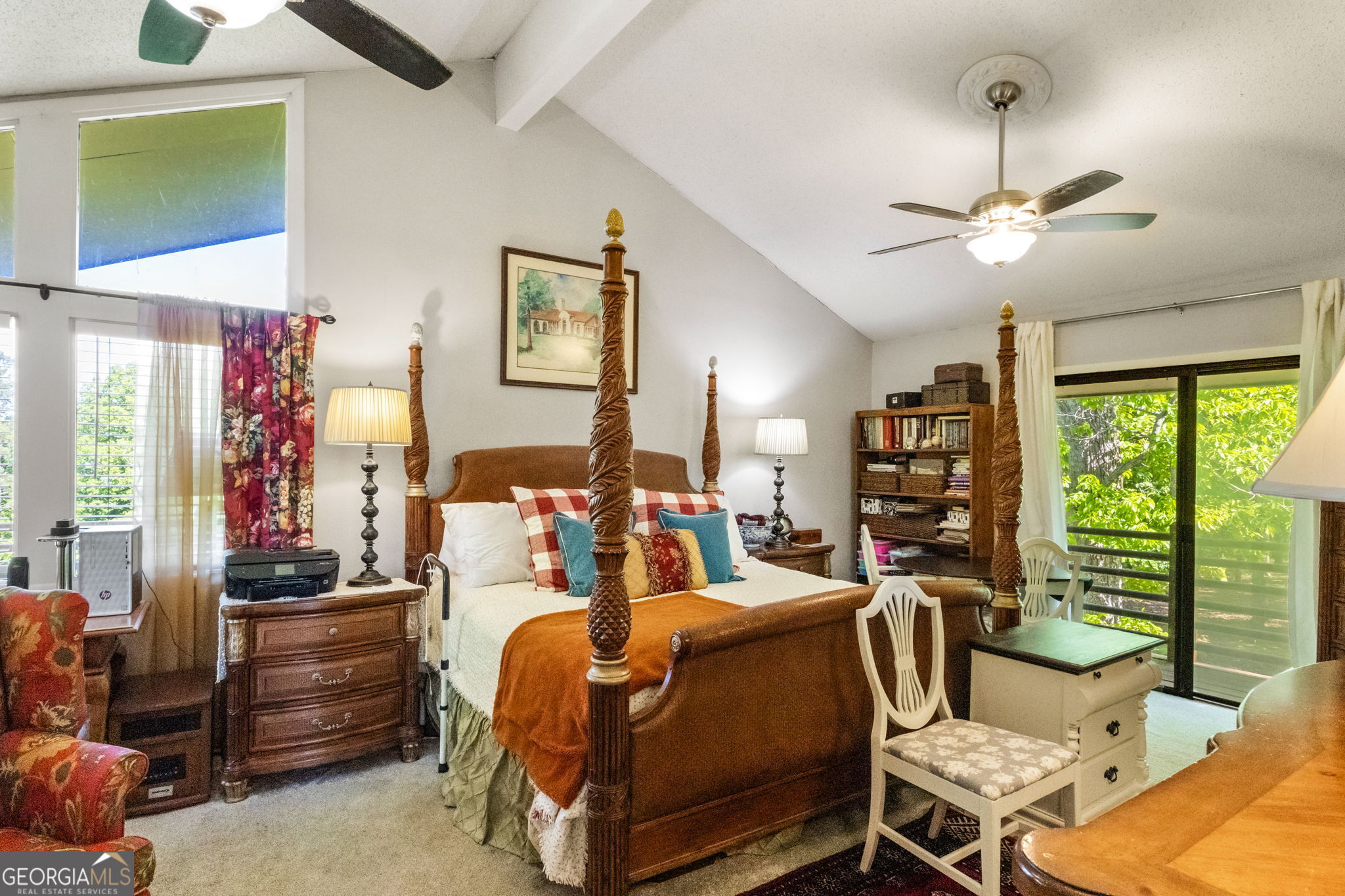 1509 High Point Road Bowdon, GA 30108 - Photo 15 of 33 a bed room with a bed and a chandelier