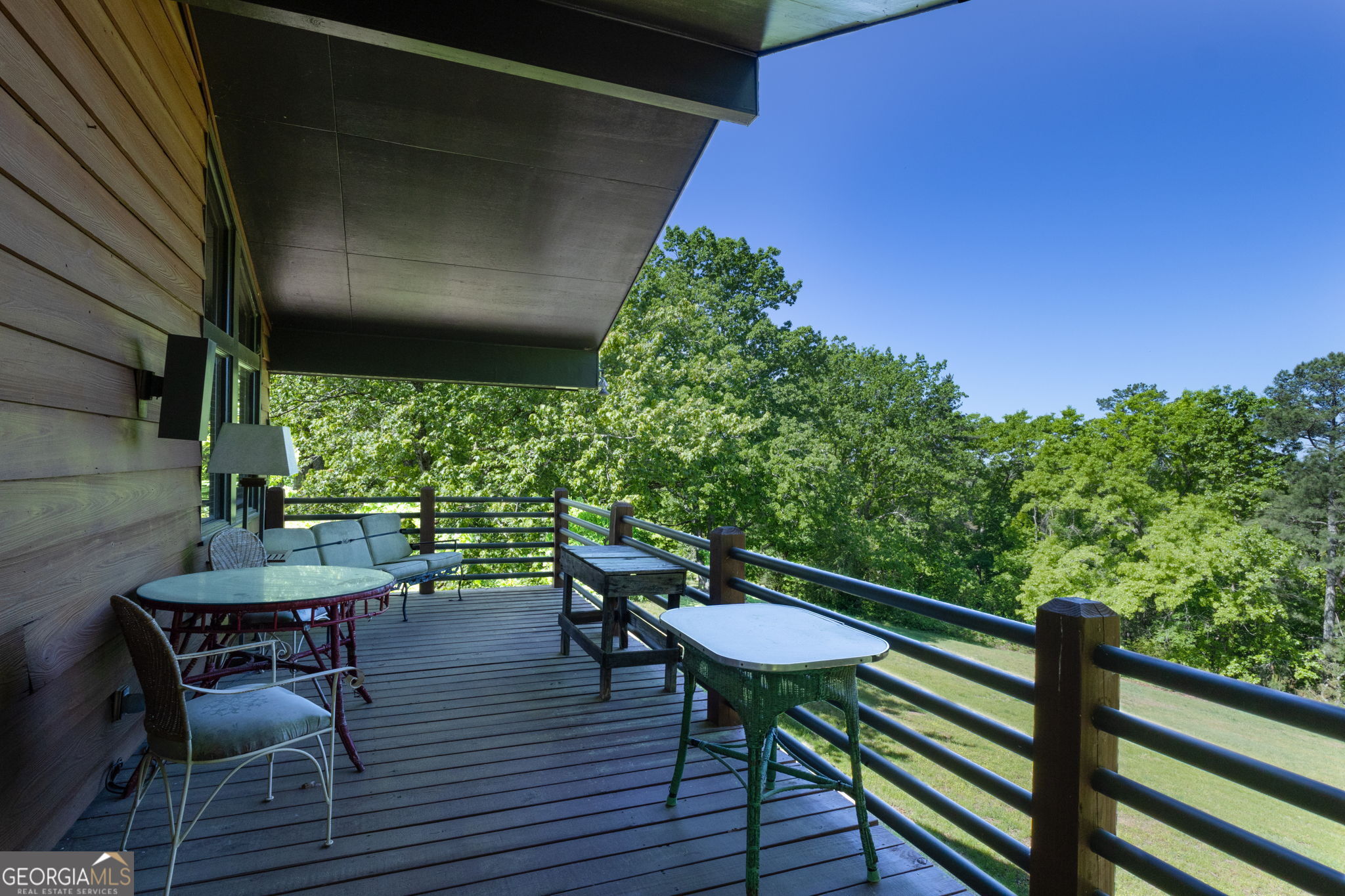 1509 High Point Road Bowdon, GA 30108 - Photo 21 of 33 a view of a table and chairs in patio