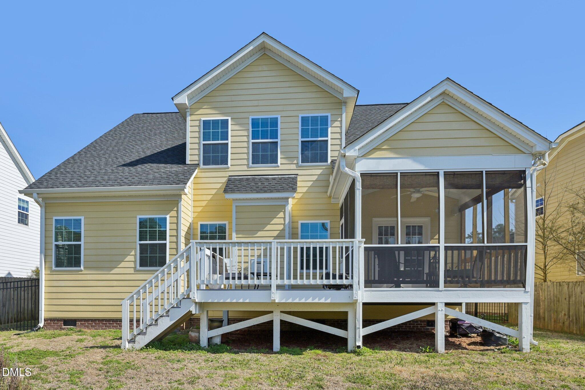 11 Hidden Ridge Court Durham, NC 27707 - Photo 29 of 30 a view of a house with wooden deck and a yard