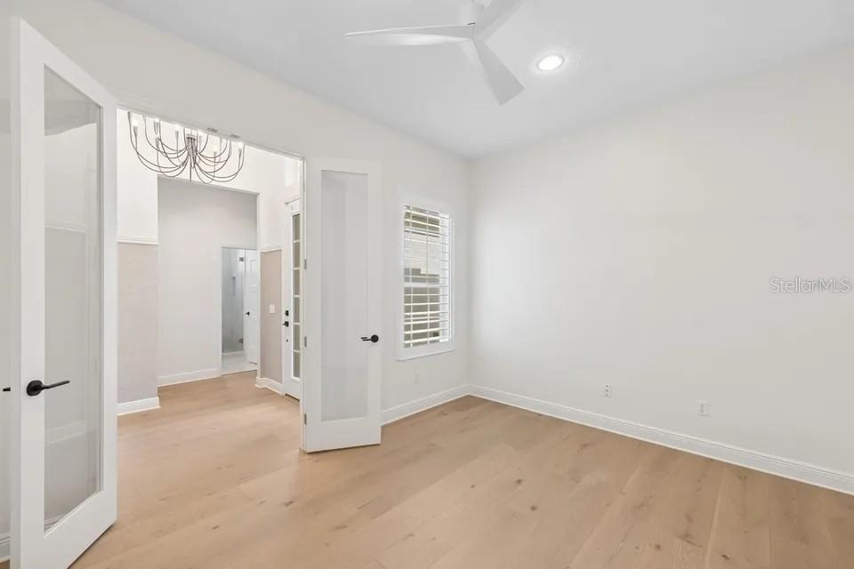 7346 Edenmore Street Lakewood Ranch, FL 34202 - Photo 27 of 70 an empty room with a empty space
