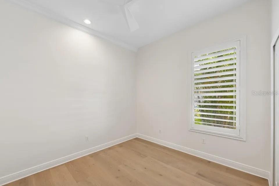 7346 Edenmore Street Lakewood Ranch, FL 34202 - Photo 34 of 70 an empty room with windows