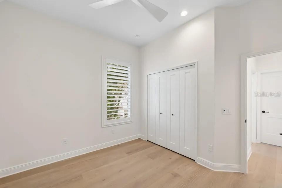 7346 Edenmore Street Lakewood Ranch, FL 34202 - Photo 35 of 70 an empty room with windows