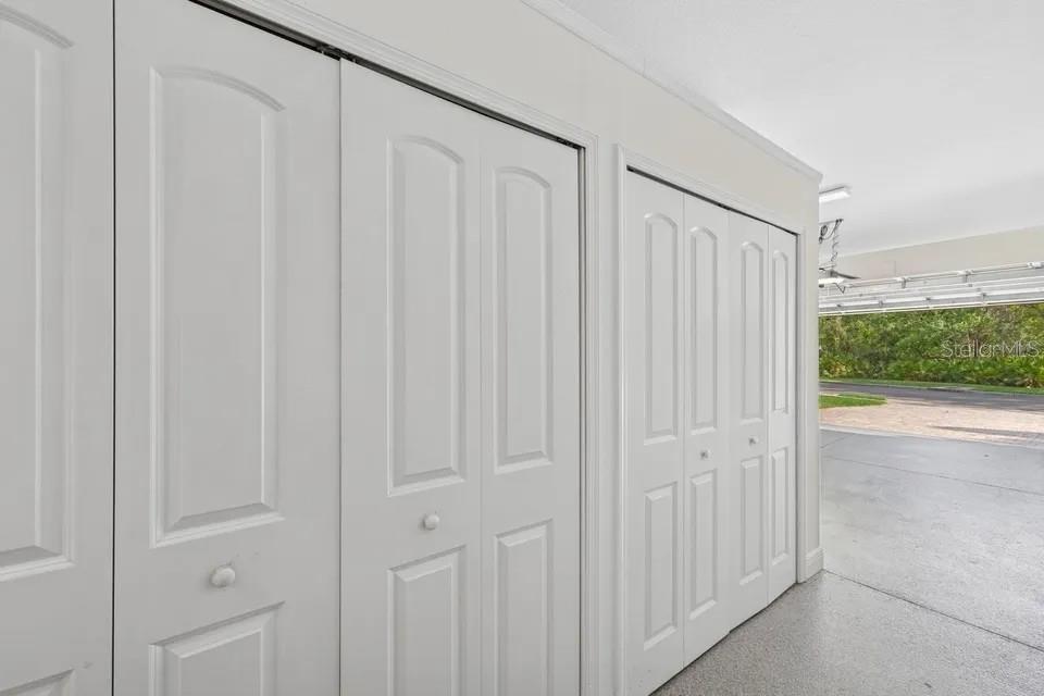 7346 Edenmore Street Lakewood Ranch, FL 34202 - Photo 40 of 70 a view of a porch with a wooden door