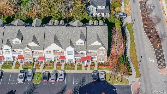 an aerial view of a city with lots of residential buildings